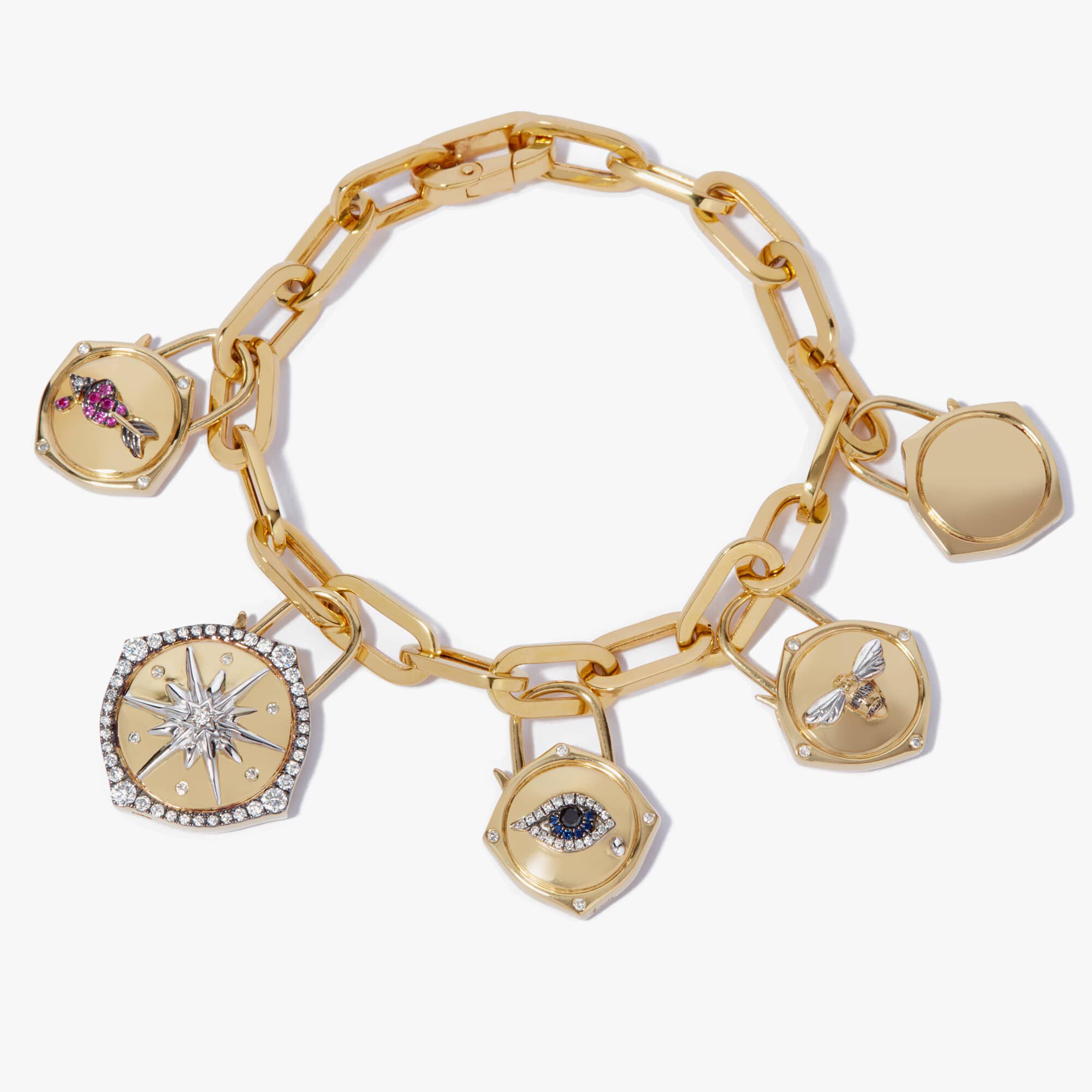 18ct Gold  Diamond Traveller Charm Bracelet