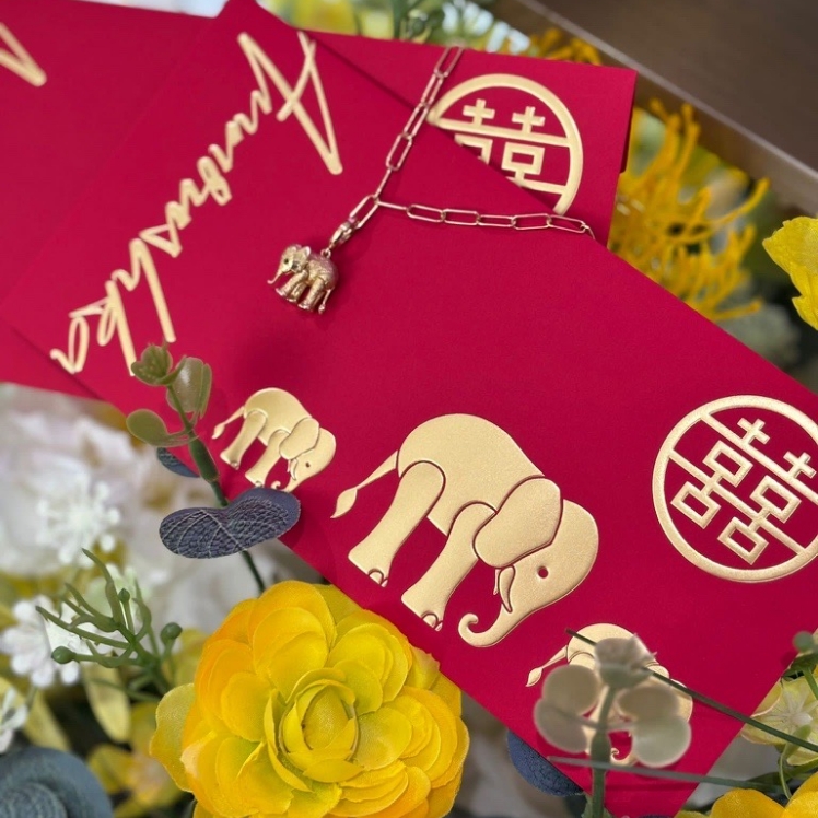 gold elephant charm and Chinese new year envelope