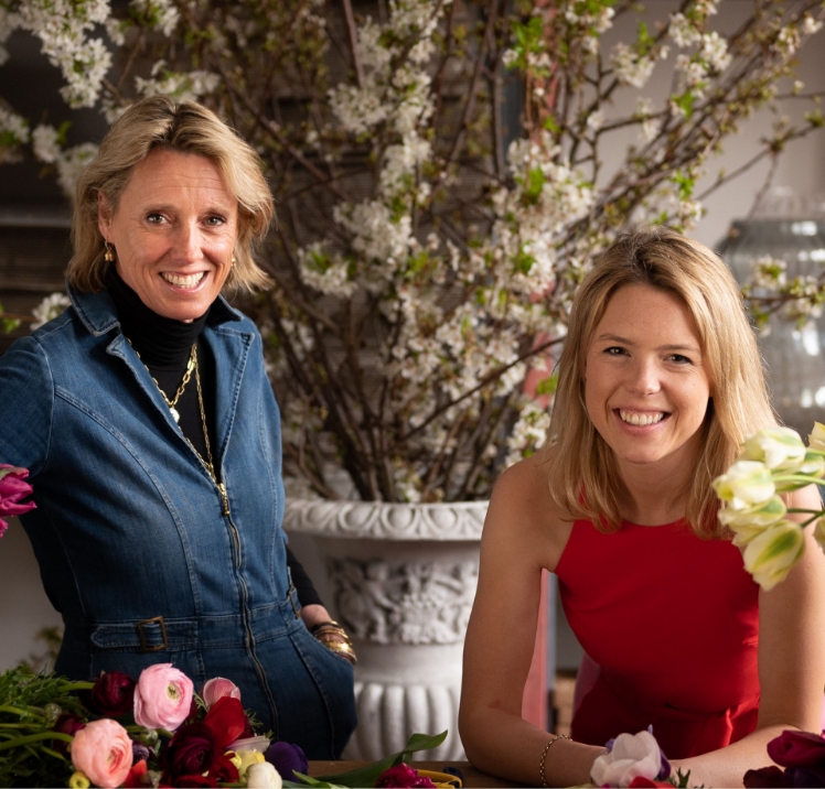 Two women smiling