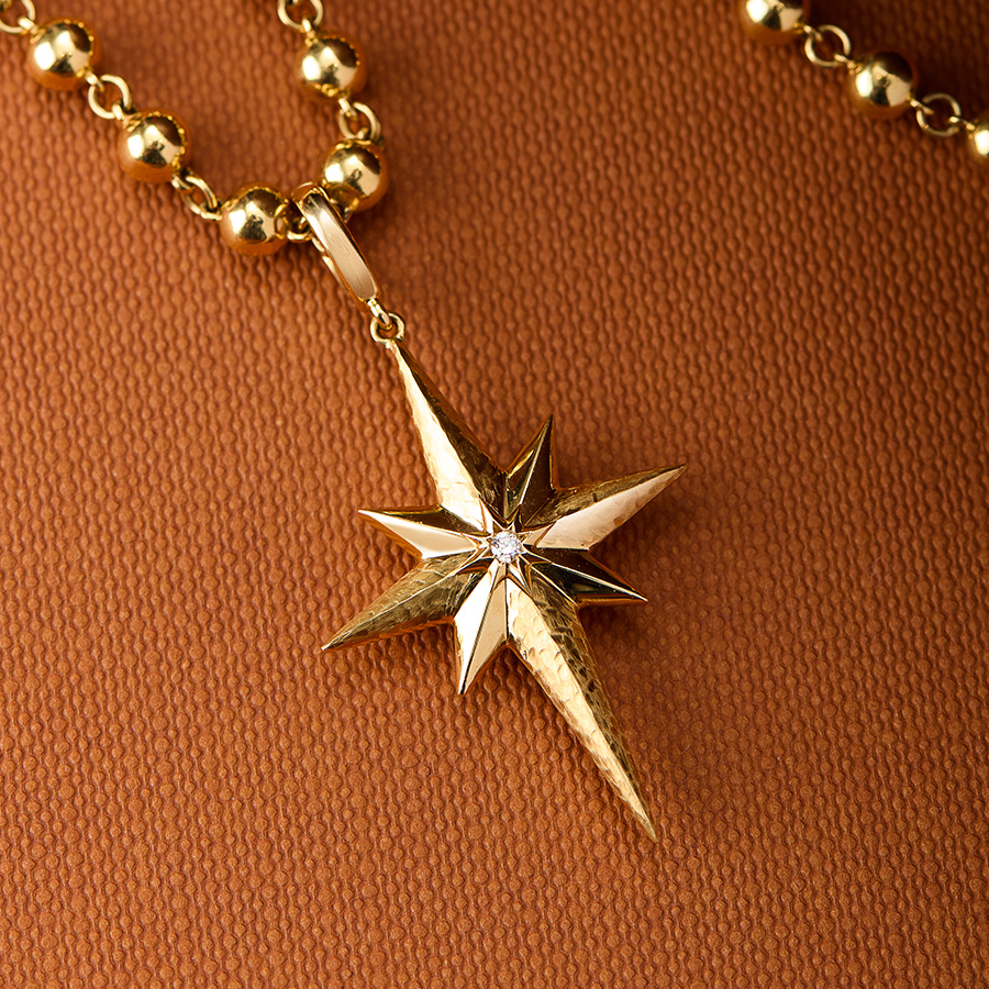 18ct gold north star charm on chain