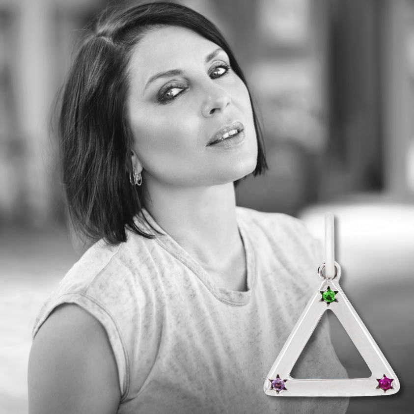 Sadie Frost with triangle shaped charm 