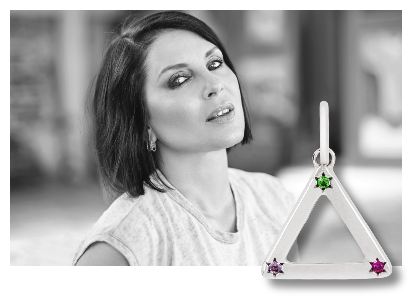 Sadie Frost with triangle shaped charm 